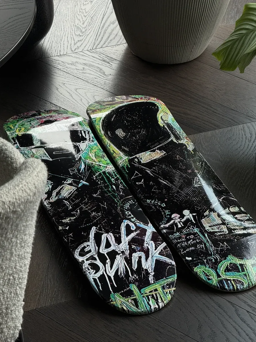 POPART'URAS deck art styled on a green wall, room context